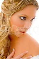 close view of blonde model applying sparkle