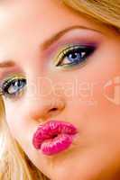 close view of attractive model giving kiss