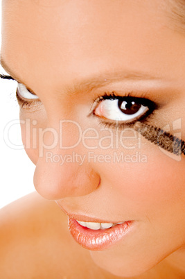 close up of young woman getting makeup