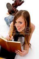 top view of smiling woman studying