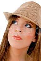 close view of young model wearing hat