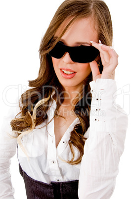 close view of female holding sunglasses