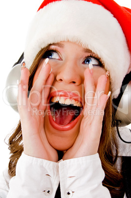 front view of shouting woman wearing headphone