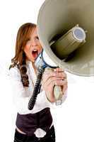 front view of woman shouting into loudspeaker
