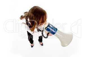 top view of woman shouting into loudspeaker