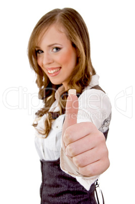 side view of smiling woman with thumbsup