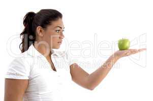woman looking the apple