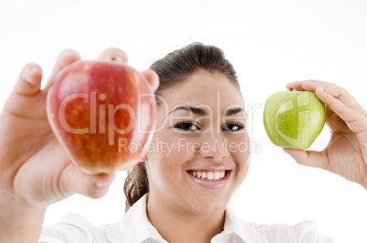 young attractive model showing green and red apple