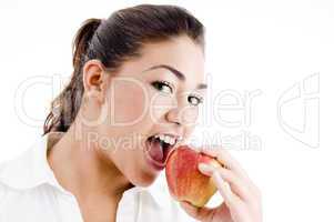 young american model eating an apple