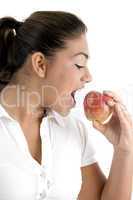young female going to eat apple