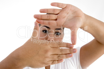 female showing framing gesture