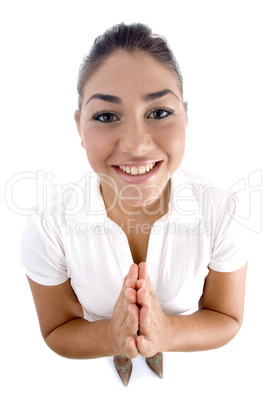 young attractive woman with joined hands young attractive woman with joined hands