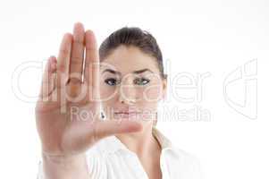 young attractive woman with stopping gesture