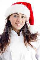 smiling chef wearing christmas hat