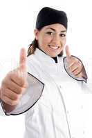 successful female chef showing thumbs up
