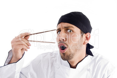 professional chef surprised with chopstick