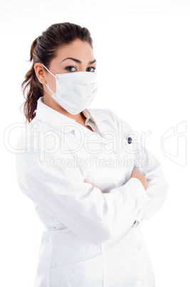 side pose of doctor with mask and folded hands