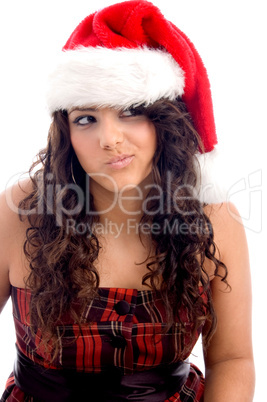 woman with christmas hat making face
