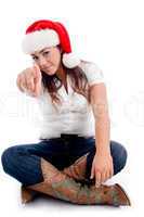 pointing woman with christmas hat