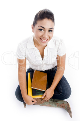 sitting female with books