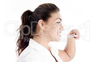 portrait of female with toothbrush