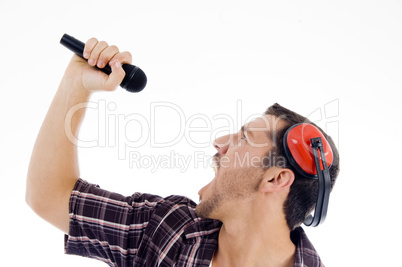 male singing loudly on microphone