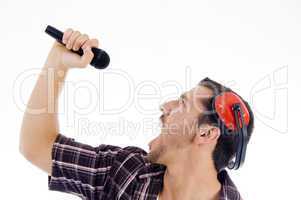 male singing loudly on microphone