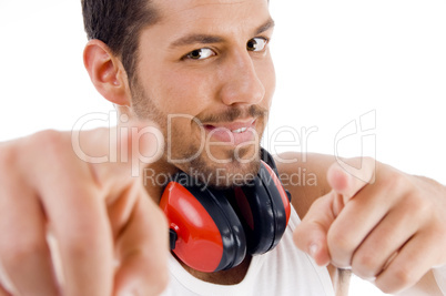 man pointing at camera with both hands