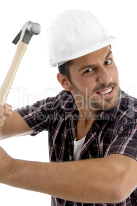 architect showing his hammer with facial expressions