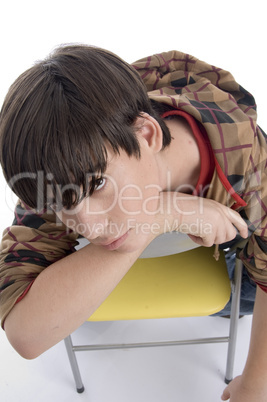 boy sitting on the chair