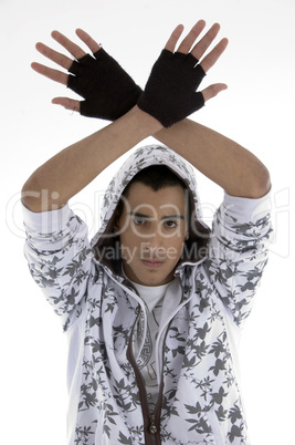 young fashionable guy posing with hand gesture
