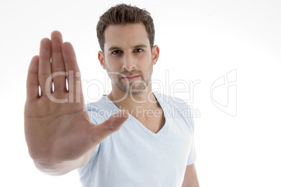 young man showing stop gesture