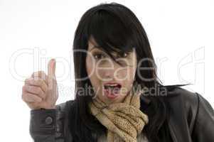woman giving shocking expression with thumbs up