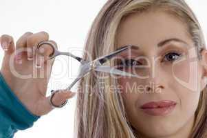 woman holding scissor