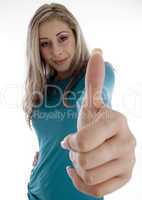 smiling woman showing approval sign