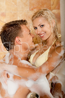 Affectionate couple bathing