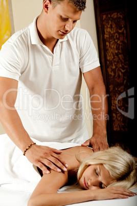Young caucasian getting a massage