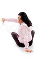 back pose of model with thumbs up on white background