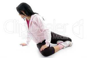 side view of woman doing exercise on white background