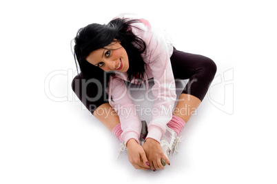 high angle view of female doing exercise on white background