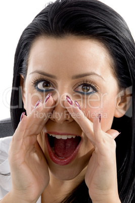 portrait of  shouting young female doctor on white background