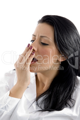side pose of doctor yawning on white background