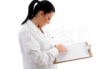 side pose of doctor giving prescription and pen on white background