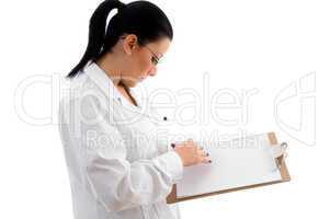 side pose of doctor giving prescription and pen on white background