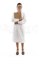 front view of doctor holding writing pad on white background