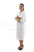 side view of doctor with writing pad on white background