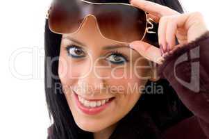 front view of female face with sunglasses on white background