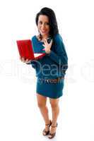 front view of pleased woman with box on white background
