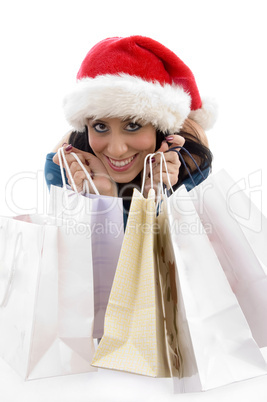 front view of happy christmas woman with shopping bags
