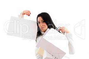 portrait of woman showing shopping bags on white background
